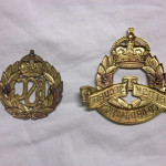 Back of the two BSC cap badges. Both were made by W. SCULLY in MONTREAL, Canada. Note that the lugs have been cut off of the larger badge.  - Colin M Stevens' Collection