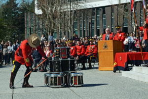 2016-03-31 RCMP Sergeant Major Hall retrieves the new mace from the drum head, Surrey BC (126)