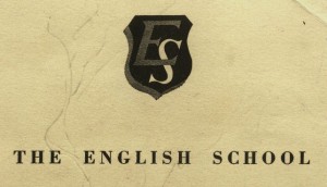 English School crest & name on notebook