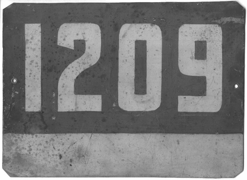 An original WWII Unit Sign brought back by a Canadian solider. Shown here in Black and white. Author's collection.