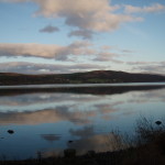 Clouds reflecting on still waters of scottish lake. Loch Rannoch, Perthshire, Scotland 2