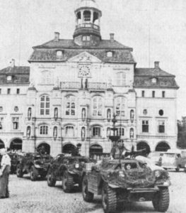 4th Canadian Infantry Brigade Canadian Ferrets, with Bren Guns mounted on top, in town square Luneburg Germany circa 1960 (Canadian Army Journal. Winter 1961 V XV No1 p30)