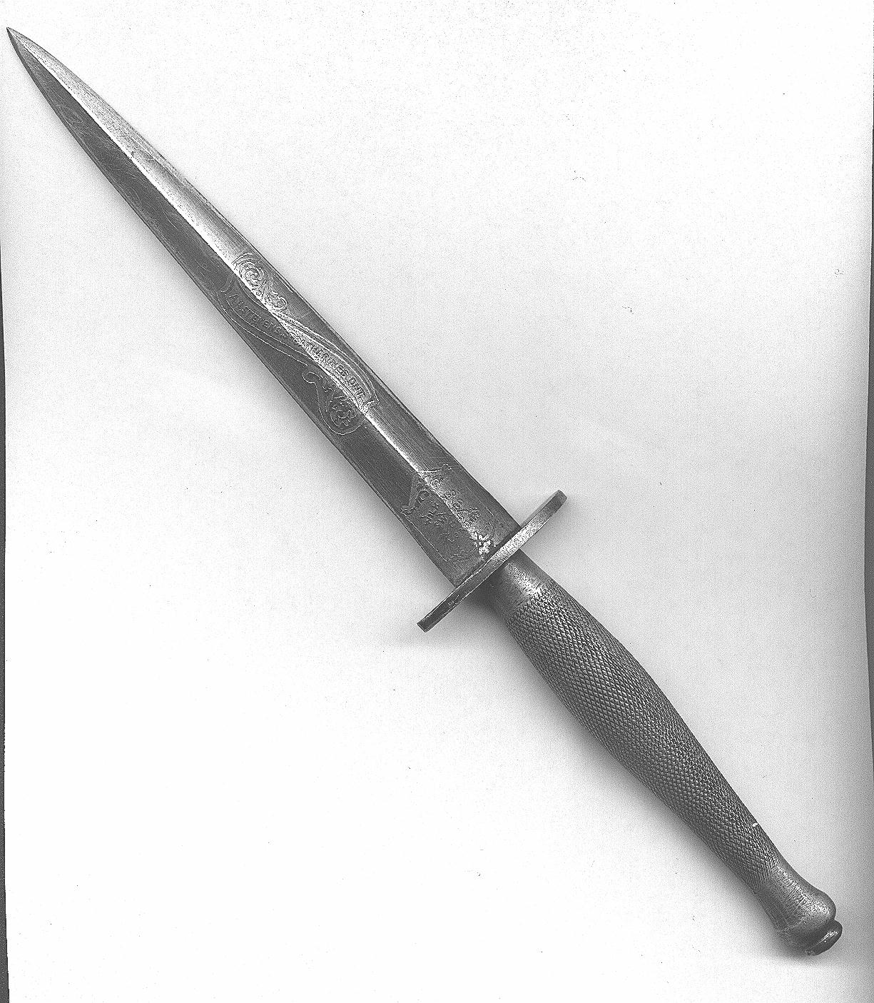 Fairbairn-Sykes Fighting Knife carried by Lieutenant A. H. Stevens of St. Catharines, Ontario. This is a knurled grip model, made by Wilkinson Sword, and with his name on the blade in a scroll. 