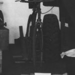 Army bicycle on display in a stand.