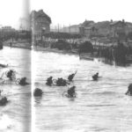 BSA Canadians_Landing Craft Infantry, Large LCIL299 soldiers disembarking carrying BSA Airborne Bicycles.