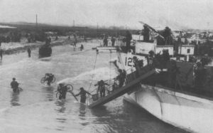 BSA Canadians Landing Craft Infantry, Large LCIL soldiers. These are troops of the Noprth Nova Scotia Highlanders and Highland Light Infantry. D-Day, June 6, 1944 in Normandy.