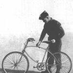 Solider tightening, or loosening, the upper butterfly nut that holds the bike open for riding. (from RAF Airborne Forces manual)