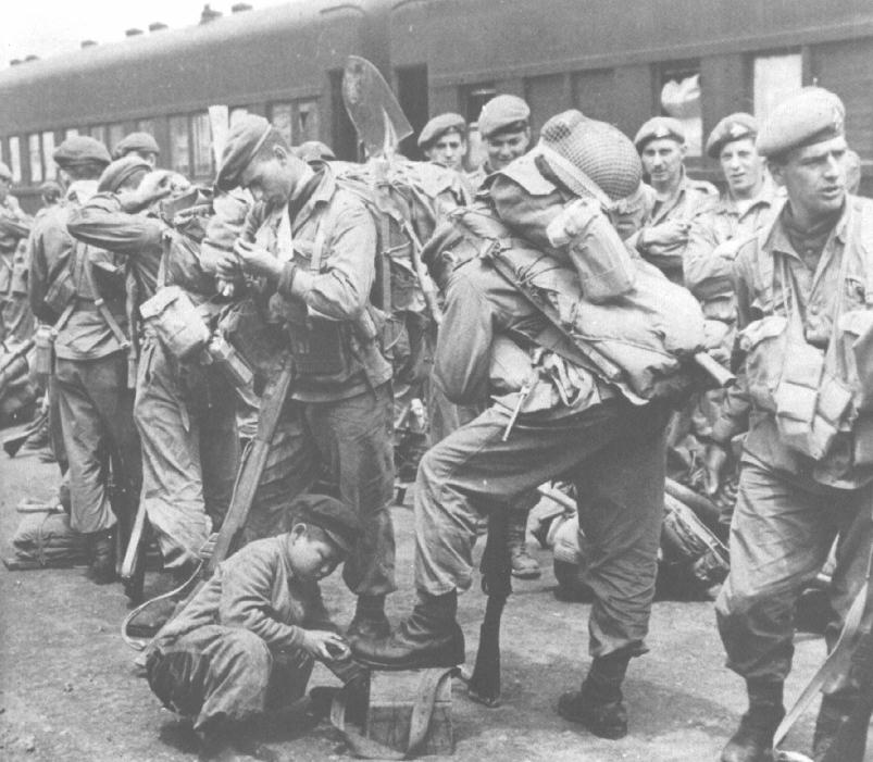 Korea - Royal 22nd Reginment (The Van Doos) May 1952 at Pusan boarding a train.