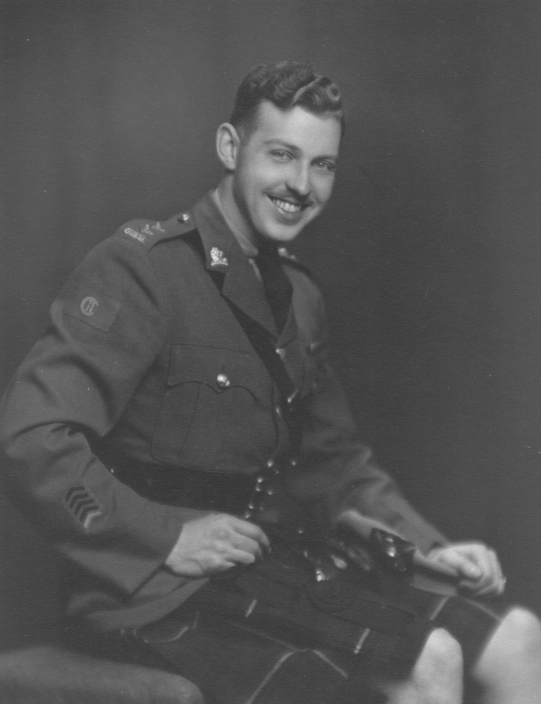 Young Canadian Army officer wearing a kilt in a formal seated portrait. Lieutenant A. H. (Pete) Stevens, Essex Scottish Regiment in Toronto, back from the UK at the end of 1944 for medical treatment. Photo was taken in early 1945.
