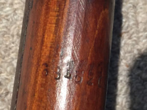 No. 4 MK. I* (T) made by SAL at Long Branch and later issued to the Indian military. Serial number 68L3200. This is the serial number stamped into the underside of the forearm, near the muzzle. The forearm appears to be locally made in India.