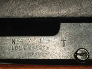 No. 4 MK. I* (T) made by SAL at Long Branch and later issued to the Indian military. The left side of the body has "No.4 MK. I* T" over "LONG BRANCH" over the year 1944. Note that Long Branch is two words.