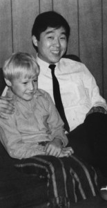 Japanes sailing ship officer with Canadian boy. Rob and a Japanese officer during a visit to our home by some of the officers from the Japanese sail training ship, T. S. Nipon Maru to Vancouver, BC in 1971.