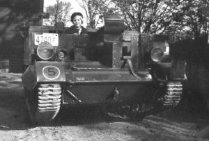 Universal Carrier Mark I shown in 1941 with a girl on board.