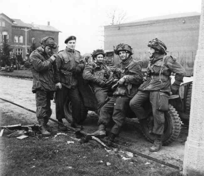 Greven, Germany, 1945. Some 1 Canadian Parachute Battalion officers with a jeep. 