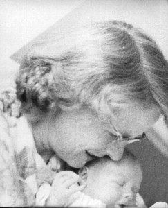 Mother holding newborn baby. Estelle Stevens holding her youngest child, the newborn Robert Duncan Stevens. Rome, Italy, 1962. 