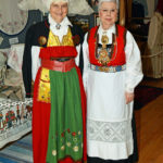 Two ladies in Scandinavian folk cotumes.