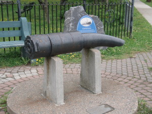 Cannon from the S.S. Mont Blanc The cannon is mounted UPSIDE DOWN! The gun was on the deck in a mounting. The blast blew it up and off the ship, breaking the barrel and bending it upwards. Plaque for cannon from the S.S. Mont Blanc. Cannon from the S.S. Mont Blanc - breech end. From the Halifax Explosion 1917-12-06