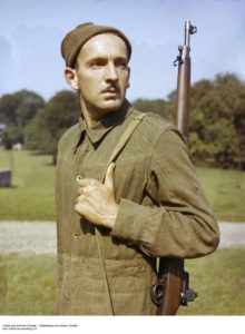 1942 approximately. Pte. John Michaud, Sniper, of Quebec with a P14 fitted with target iron sights. He is wearing coveralls for training. He appears to have survived the war. L&AC mistakenly dated it 1942-1965 and still in copyright . It is 1940-1945 and not in copyright. (L&AC MIKAN 4232750 )