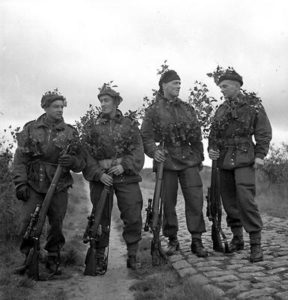 1944-10-09 Approximate date. Queen's Own Cameron Highlanders of Canada. This group of snipers killed 101 enemy up to that date. Cpl. G.E. Mallery; Pte. J. Gray; Cpl B. B. Arnold; Sgt. P. A. Rylaasden (L&AC ________________)