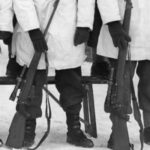 DETAIL showing two different model Lee-Enfield No. 4 sniper rifles - 1945-01-12 Third Snipers' Course at Camp Borden, Ontario, Canada. Note the variety of No. 4 (T) rifles. (Private collection)