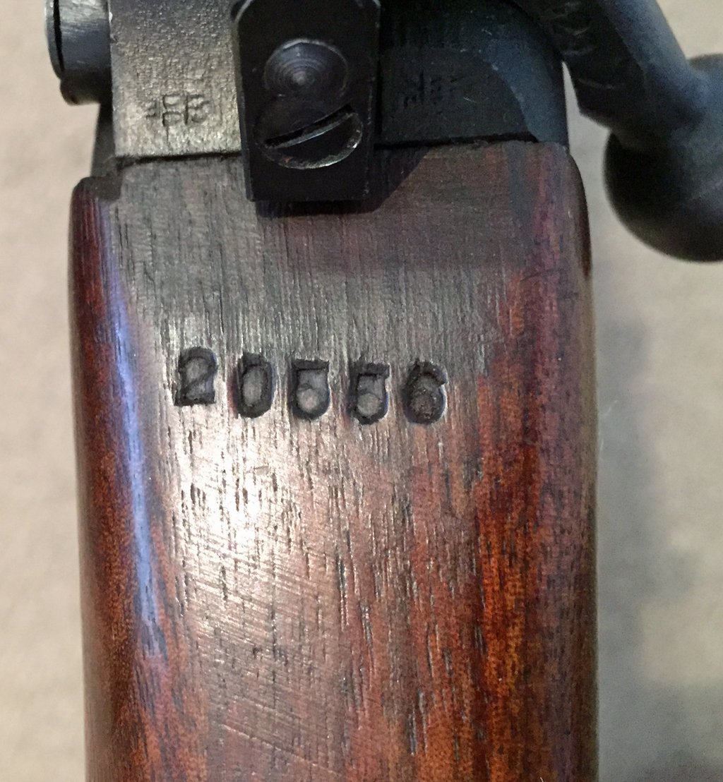 1944 Lee-Enfield No4 MKI (T) BSA sniper rifle - underside of top wood showing scope serial number stamped into the top of the butt, just behind the cocking piece. 