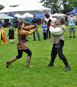 Husband and wife sorting out their differences at the Highland Games Victoria 2012 May