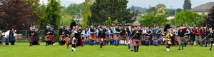 Massed pipe bands at Victoria Highland Games