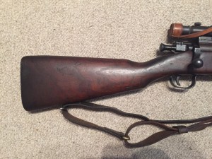 A late 1943 M1903A4 serial number 3422193. This rifle is original with the blued finish but the M73B1 scope has been refurbished by the military. - Right side of butt.