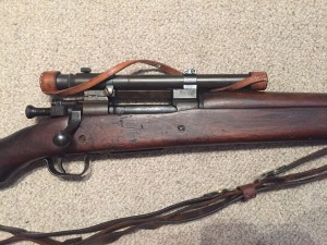 A late 1943 M1903A4 serial number 3422193. This rifle is original with the blued finish but the M73B1 scope has been refurbished by the military. - Right side of centre section of rifle.