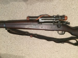 A late 1943 M1903A4 serial number 3422193. This rifle is original with the blued finish but the M73B1 scope has been refurbished by the military. - Left side of centre section of rifle.