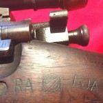 M1903A4 Left side showing the markings "RA (for Remington Arms, not Raritan Arsenal), Crossed cannons and FJA (Frank J. Atwood)