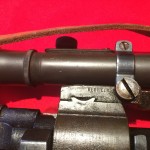 M1903A4 showing right rear scope mounting on REDFIELD JUNIOR mount. To remove scope, undo the large screw on RIGHT side (only), then rotate scope horizontally to right 90 degrees. Then one can lift it out of the front mounting point.