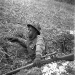 1943-04-23 Unidentified 2nd Canadian Infantry Division sniper with No1 sniper on sniper course in England Photo by Lieut. Frederick G. Whitcombe (L&AC PA-211642 MIKAN 3596209)