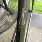 British Army BSA airborne bicycle, 2nd model, made circa 1943 serial number R37618 - Detail of decal (transfer) on seat tube. BSA piled rifles "TRADE MARK" and letters BSA underneath. These have been seen in silver as well as in gold colour.