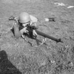 British soldier aiming his rifle.