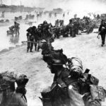Sniper on D-Day 1944 JUN 6. Note cheek rest. Sword Beach (D-Day by Badsey p99)