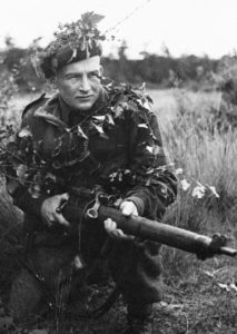 1933-10-09 ? A sniper of the Scout Platoon, Queen's Own Cameron Highlanders of Canada at Brasschaat, Belgium. DND photo (ref. The Lion Rampant p. 72)