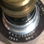 Telescope Observing Sniper's C MK I markings. "R.E.L. / CANADA"; next line "1944 318-C"