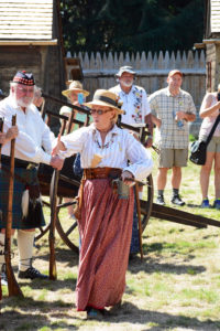 Fort Nisqually Brigade Days 2016 AUG (55) Sue Morhun welcoming a new recruit for the Fur Brigade.