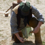 Fort Nisqually Brigade Days 2016 AUG (81) - Starting fire with flint and steel. He succeeded,