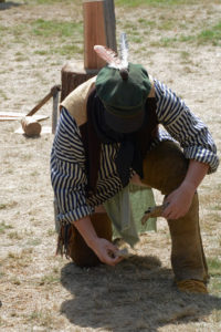 Fort Nisqually Brigade Days 2016 AUG (81) - Starting fire with flint and steel. He succeeded,