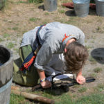 Fort Nisqually Brigade Days 2016 AUG (87) - Setting a beaver trap.