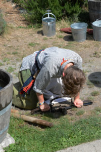 Fort Nisqually Brigade Days 2016 AUG (87) - Setting a beaver trap.