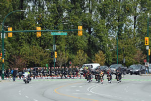 (9) The Seaforth Highlanders of Canada turning off of Cornwall Avenue onto Burrard Street.