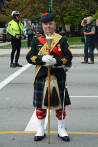 (38) Drum Major standing easy on parade on Burrard Street.