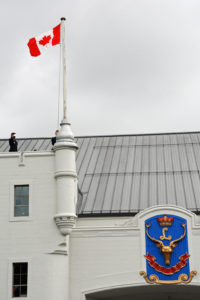 (47) (46) Raising the Canada Flag signifying reoccupation of the Seaforth Armoury.