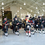 (176) Seaforth Pipes and Drums during a march past.