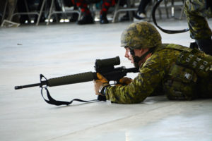 (423) A C6 Race team member with C7A1 rifle.