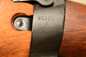 Socket showing the serial number 0C820 over the U.S. Ordnance flaming bomb. No year here. The early Stevens-Savage rifle had the year on the left sidewall (1941 or 1942). These 1,403 rifles did not have the "TR" stamp.