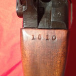 The original and first scope serial number 1810 stamped into the wrist.